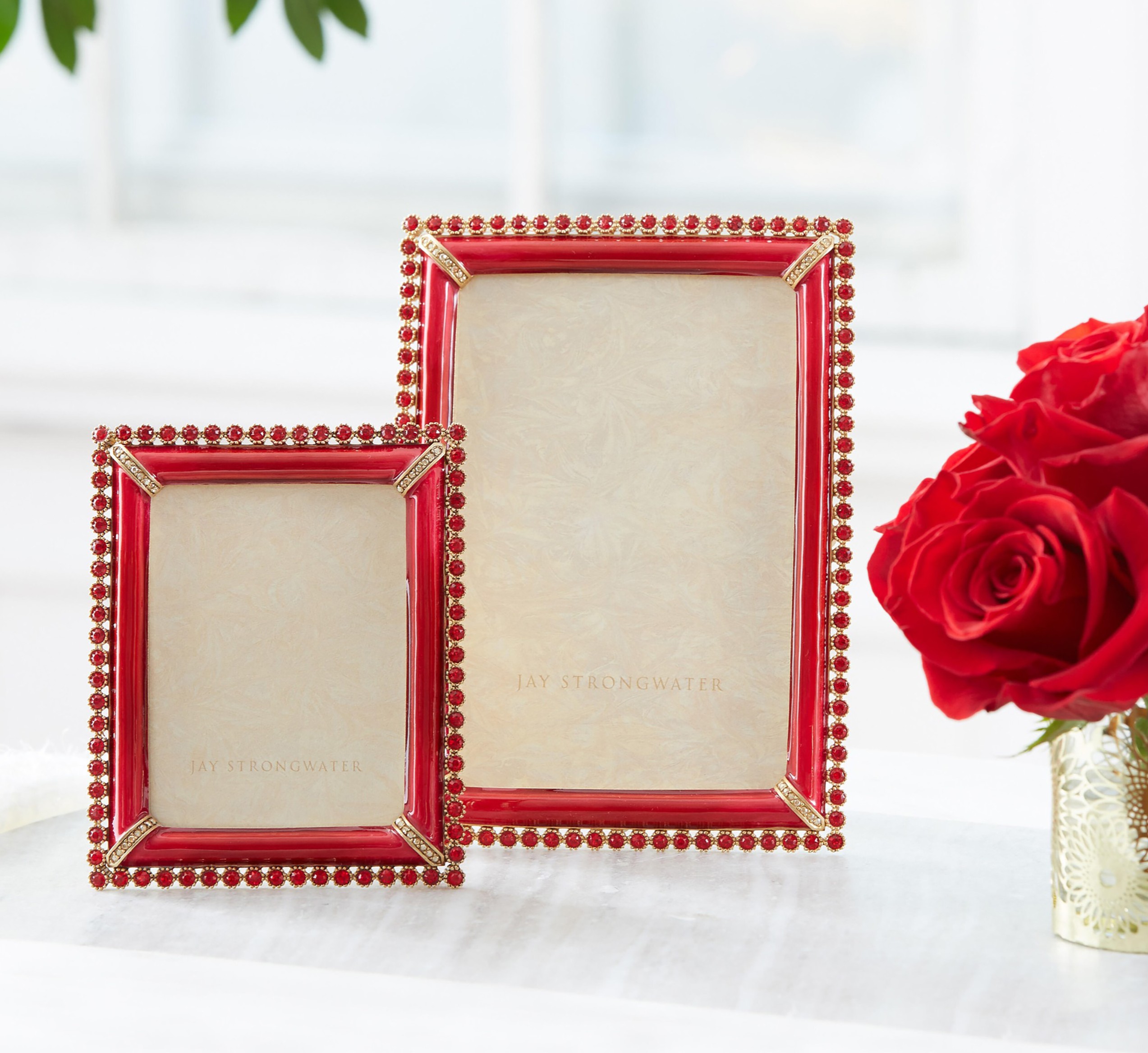 Our finest artisans apply layers of hand-painted enamel and hand-set sparkling European crystals along the border to create a deep, jewel-toned finish. 