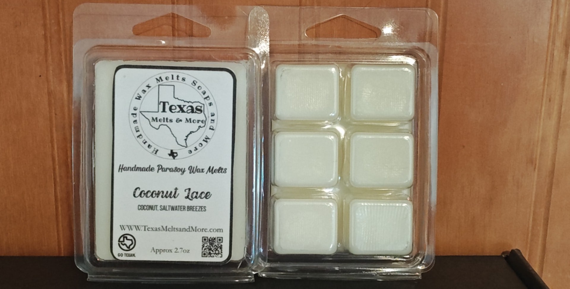 Handmade wax melts poured into a clamshell container.  