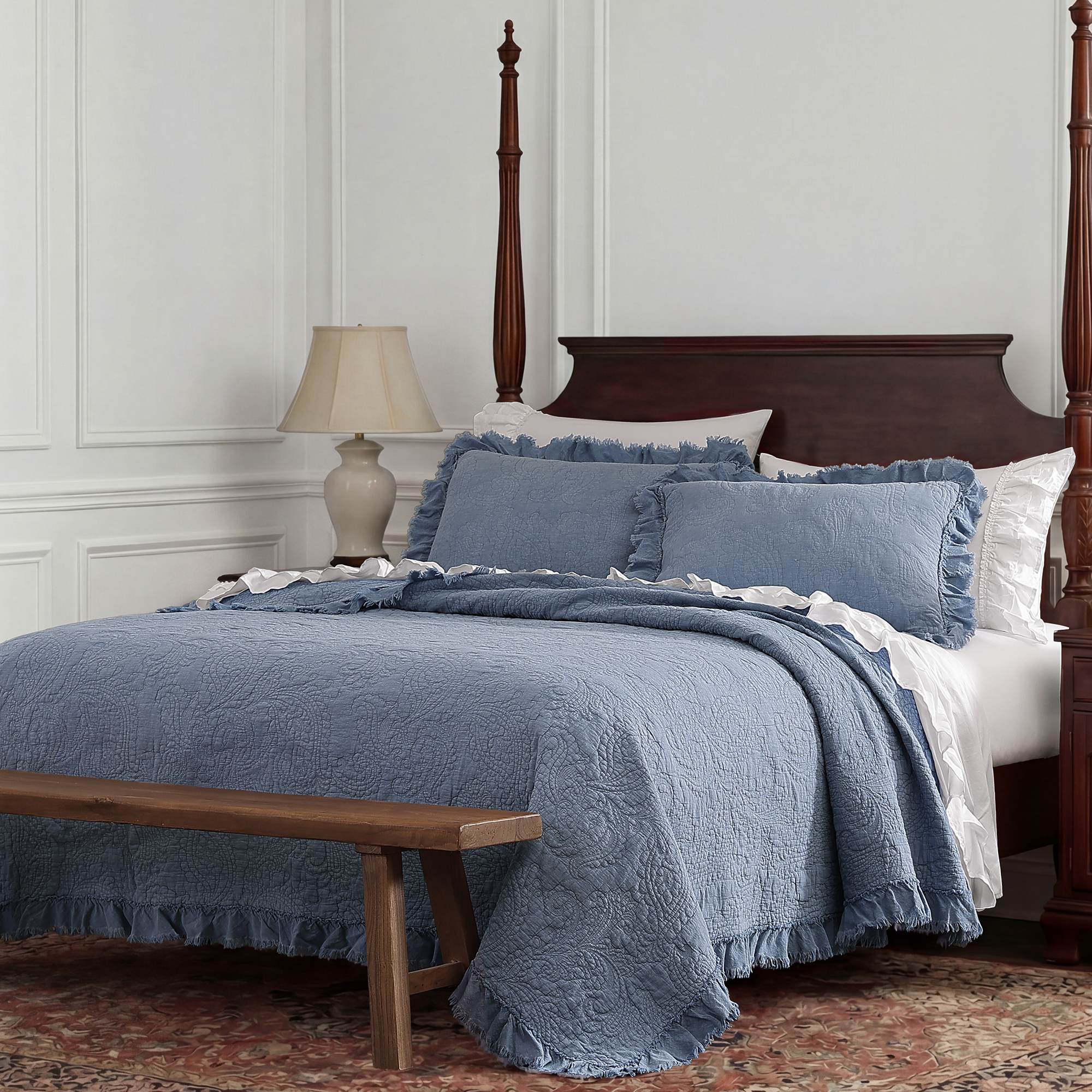 Stonewashed cotton with paisley weave and ruffled edges. Quilted for softness with a relaxed, vintage feel.