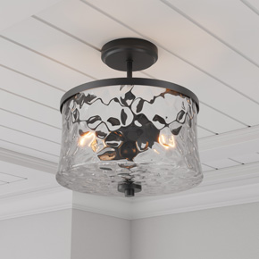 Clear, stone water glass shades emitting a gorgeous, dappled lighting effect provide the Clarvyn Collection with a look of distinction.