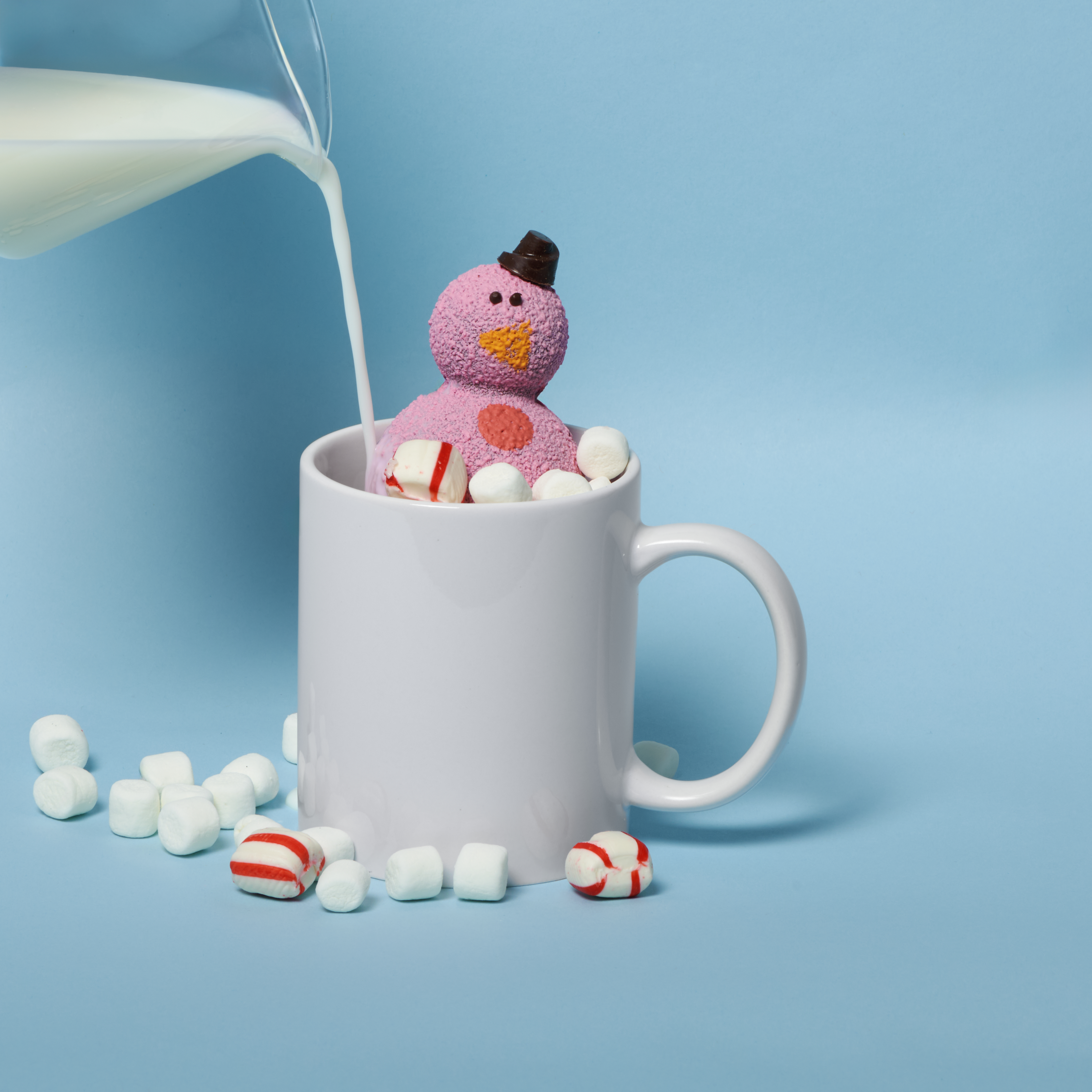 CARLA is a peppermint twist on our classic hot chocolate experience. Just heat up a mug of milk, drop Carla in, and watch her melt into a minty, magical cup of hot cocoa!
