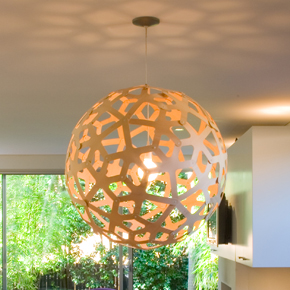 David Trubridge’s signature Coral design is made from sustainable bamboo and offered in many finishes and sizes. Coral paints beautiful shadows on walls or ceilings surrounding the fixture. 