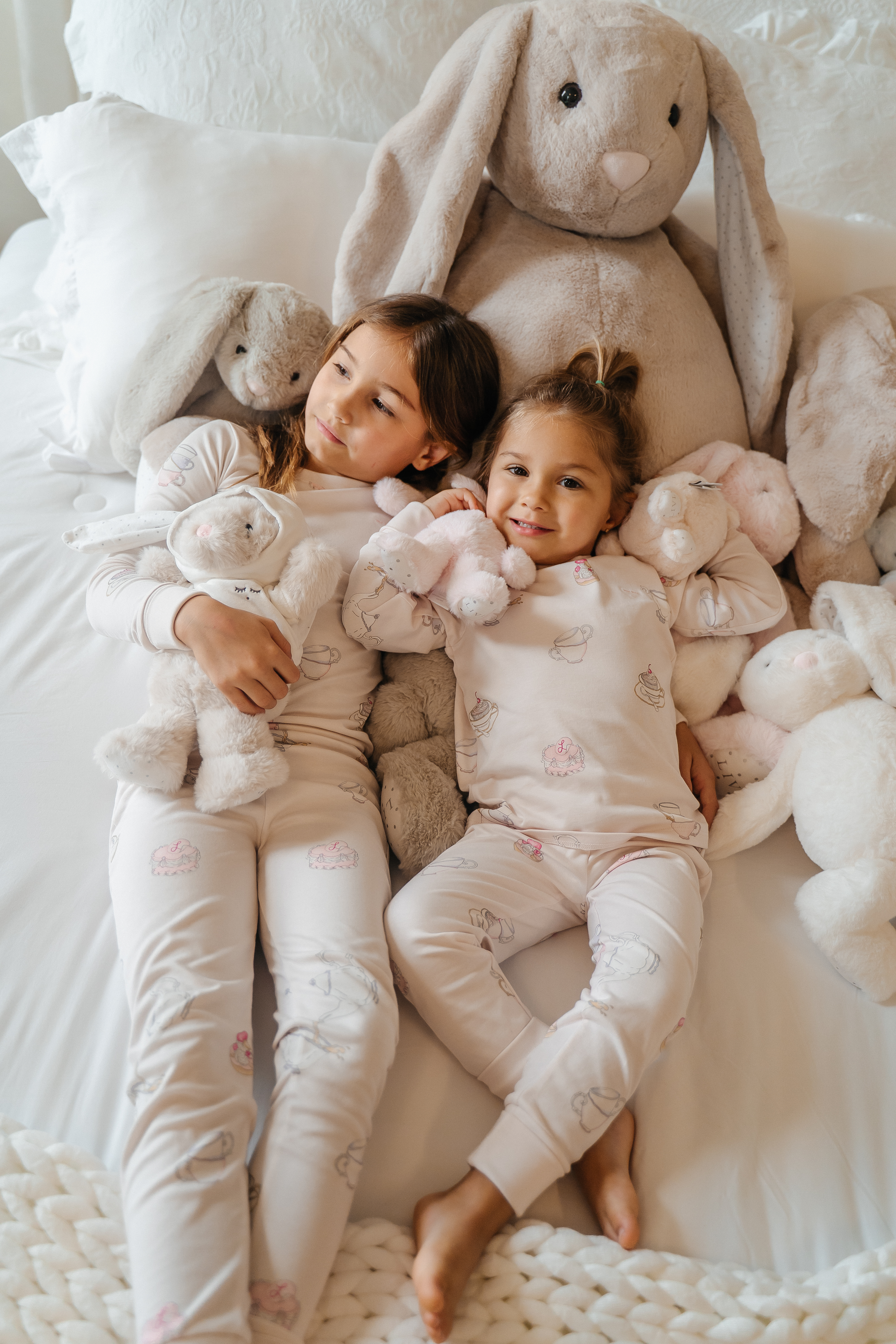 pajamas and stuffed rabbits