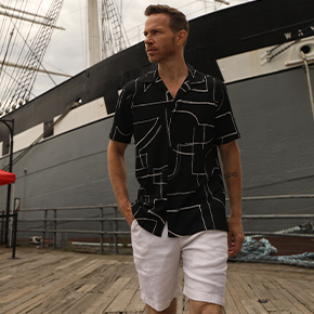 Lightweight and breathable for wearing to the beach or outdoor event, the clean abstract lines overlapping throughout this Black shirt mimic those of Picasso in many of his famous paintings.