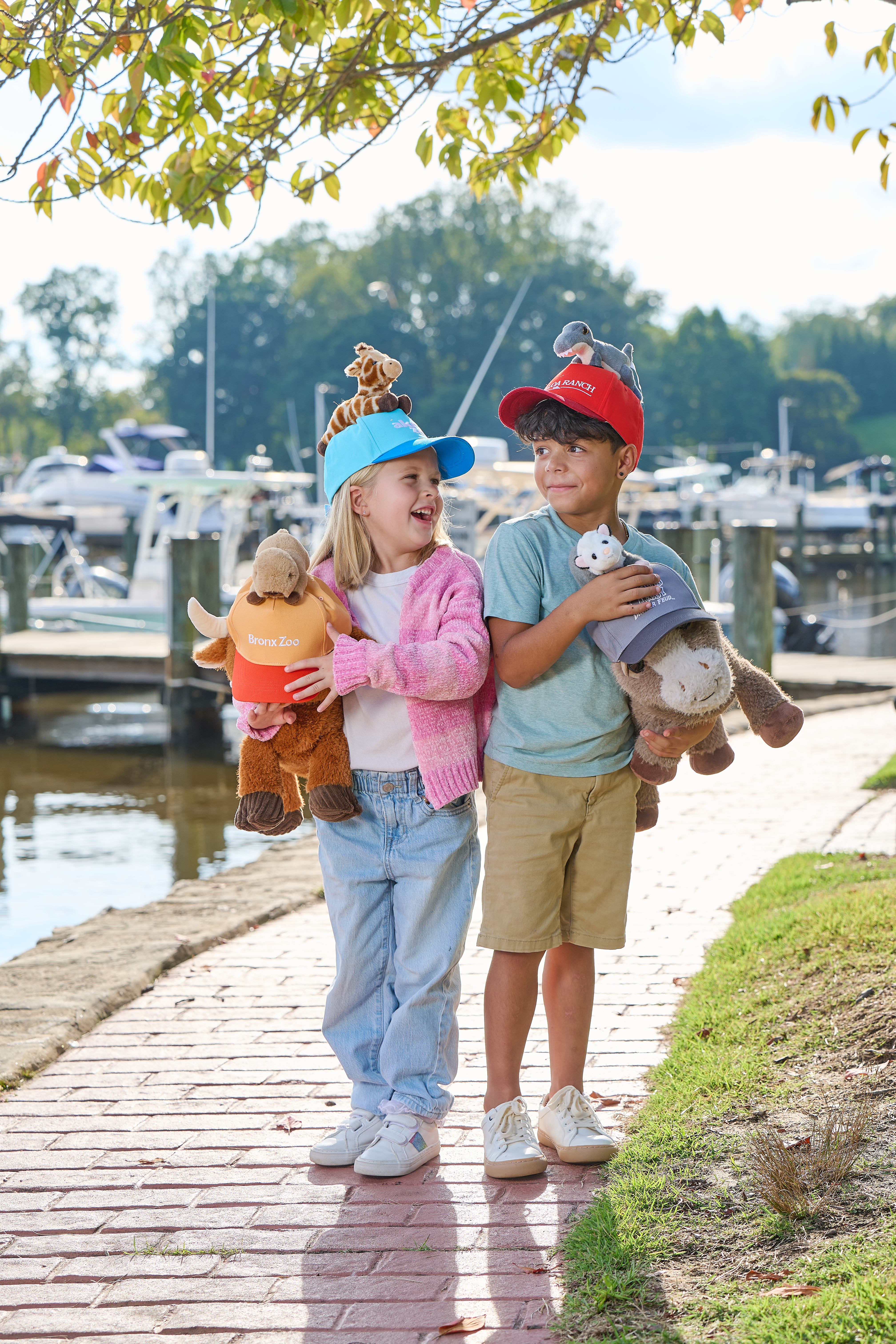 Chidren's ball cap with plush animial