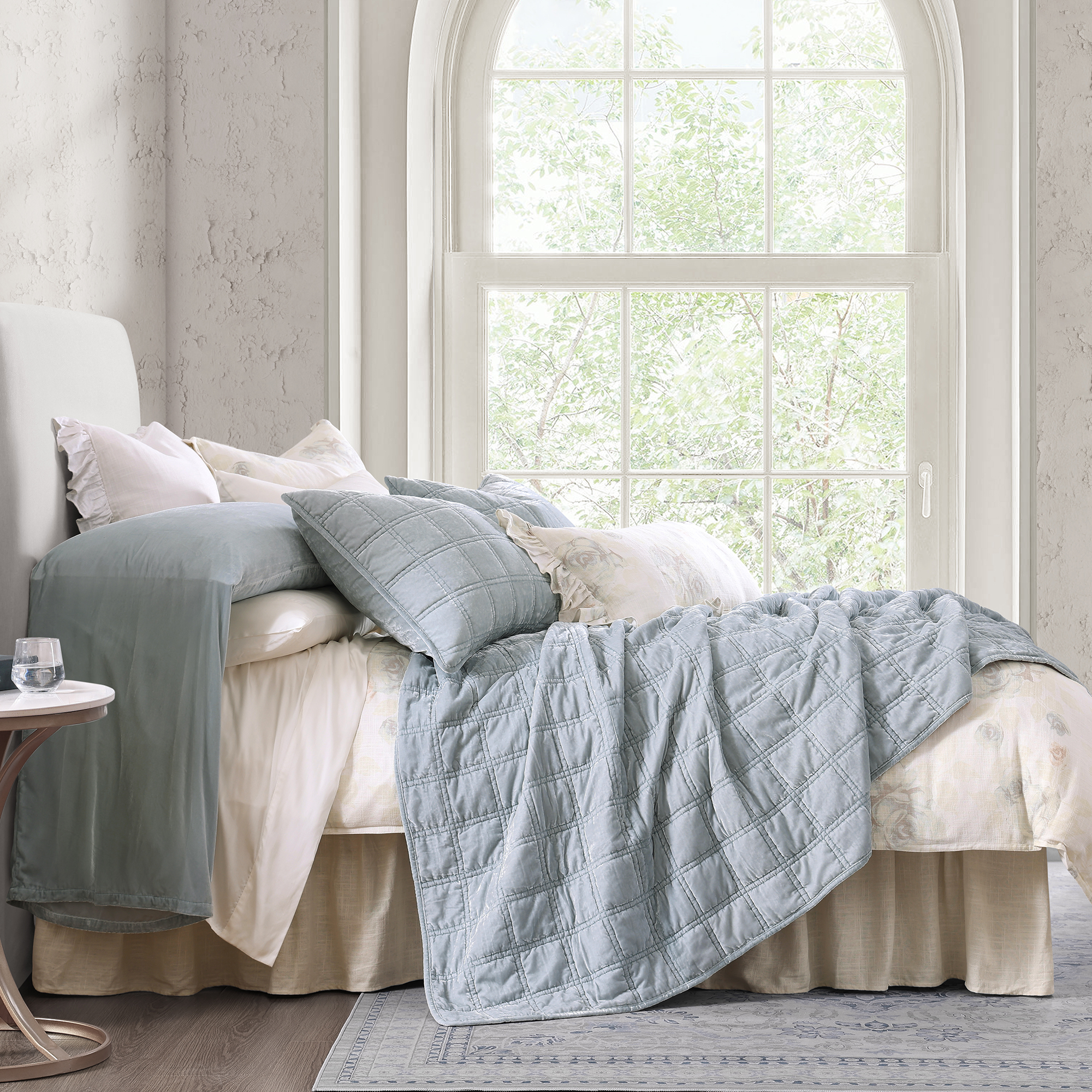 This bestselling lightweight velvet quilt features classic double box stitch quilting that adds depth, texture, and enhances the sheen of the rich fabric.