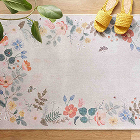 Rifle Paper Co. x Loloi offers a vibrant collection of rugs, pillows, and wall art inspired by Anna Bond's original paintings.