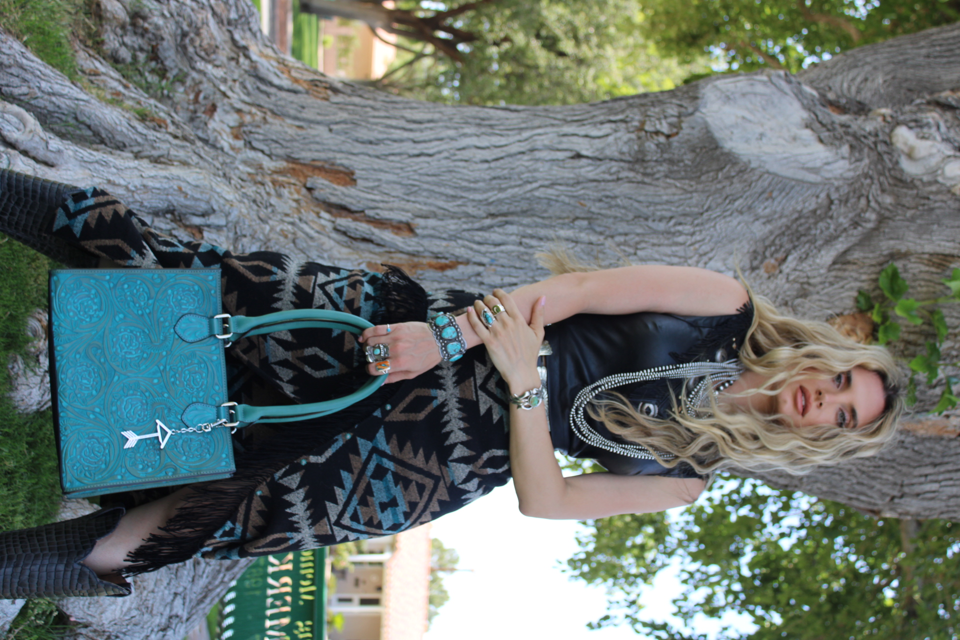 This beautiful leather, fully tooled tote bag is the perfect accessory for any occasion 