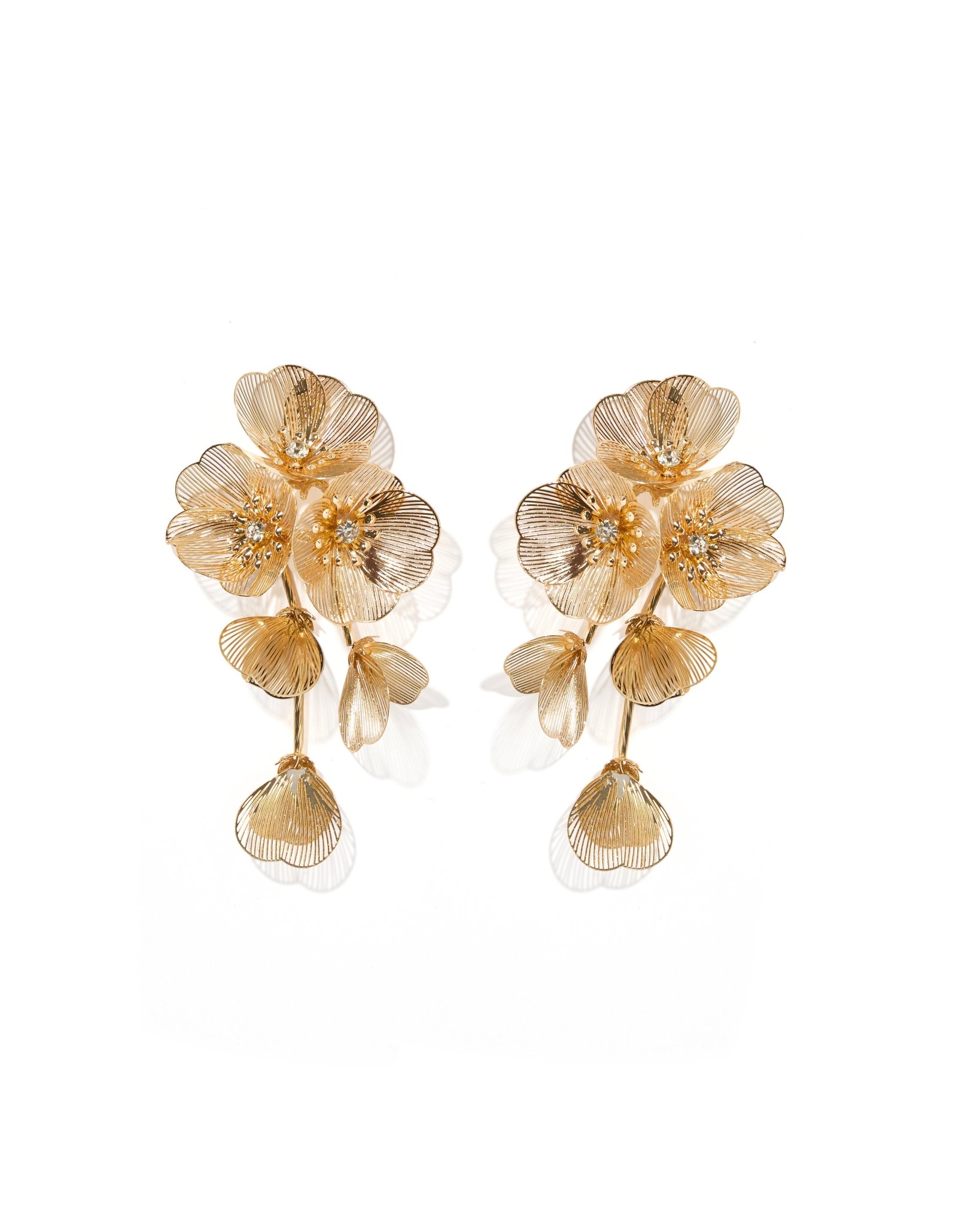 Audrey Gold Statement Earrings feature oversized cascading florals with sparkling rhinestone centers. Lightweight yet bold, they're perfect for weddings, parties, and special occasions.