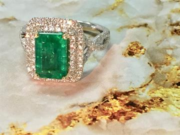 Natural emerald and diamond ring
