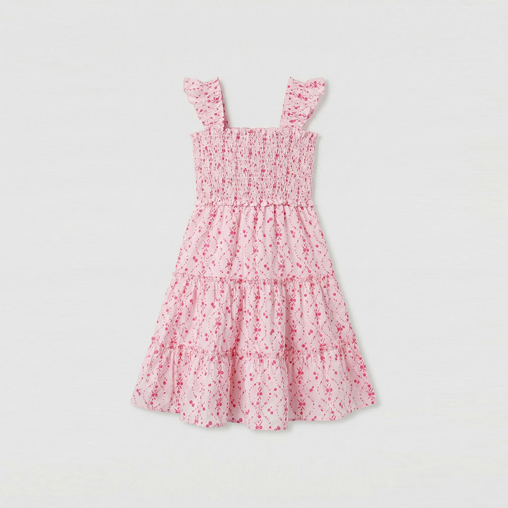 Pink tiered ruffle dress in whimsical floral print