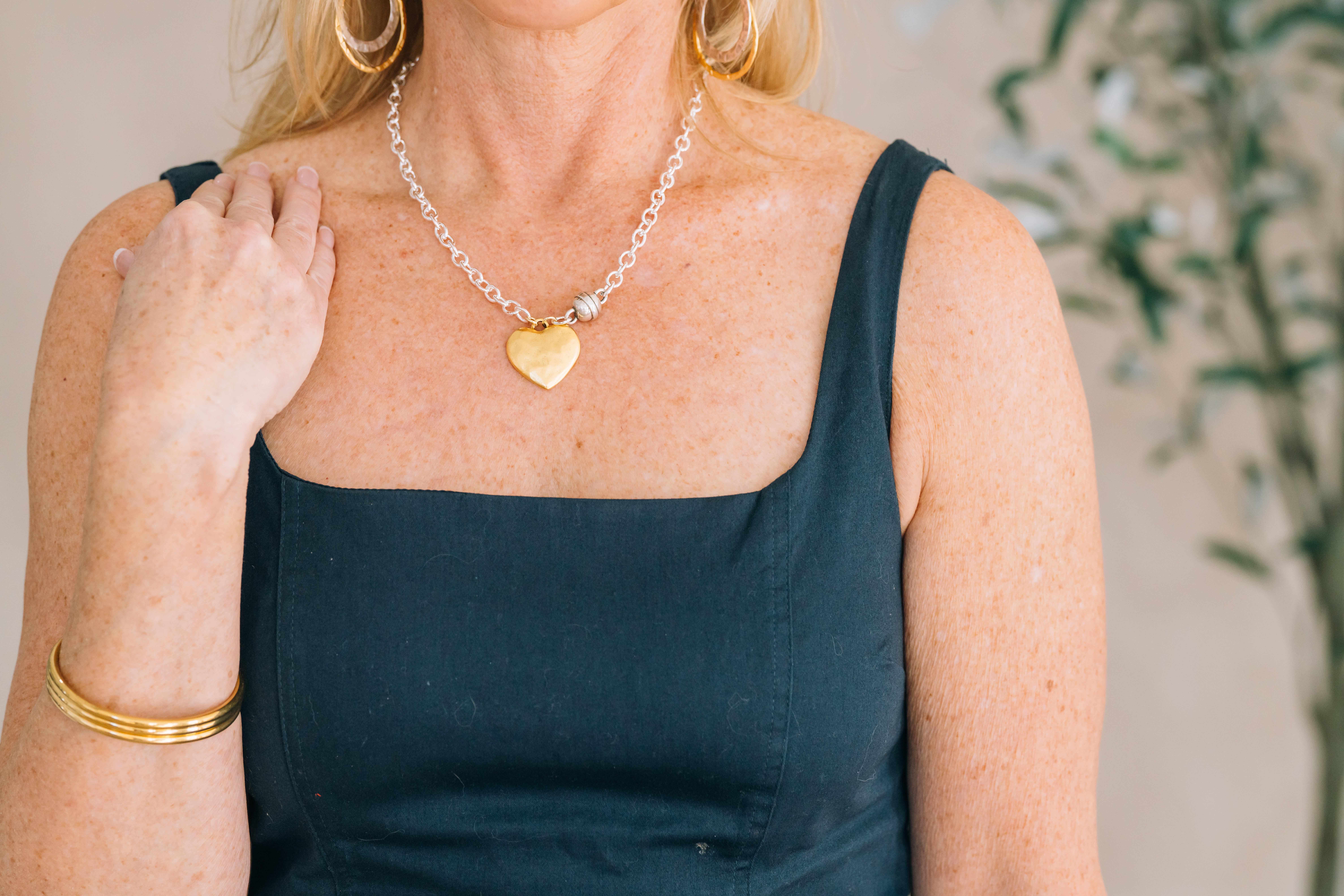Mixed Metal necklace silver and gold with artisan heart charm