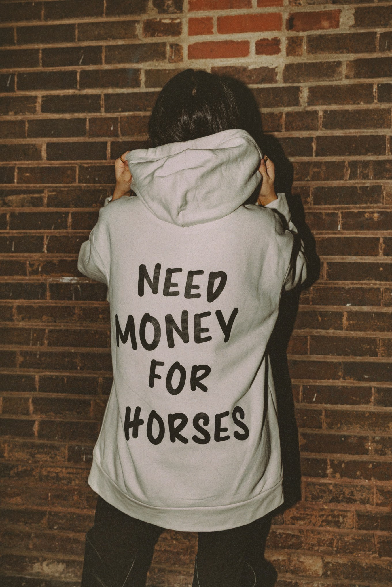 Natural or Black Hoodie with "Need money for horses" printed large on the back & RH logo on the front chest 