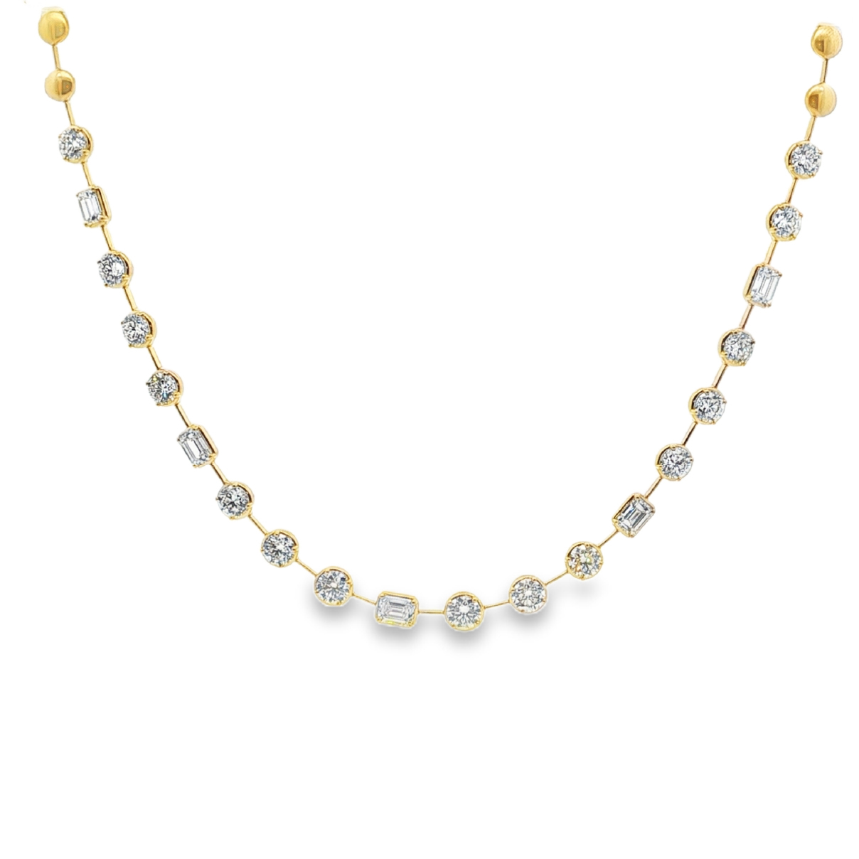  Round brilliant cut diamonds are set in a delicate rose gold, offering a harmonious balance of sparkle and warm, subtle luxury.