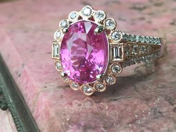 Pink sapphire and diamond engagement ring