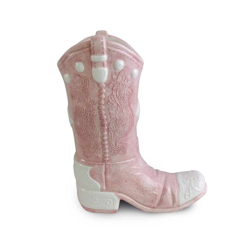 Ceramic cowboy boot vase.