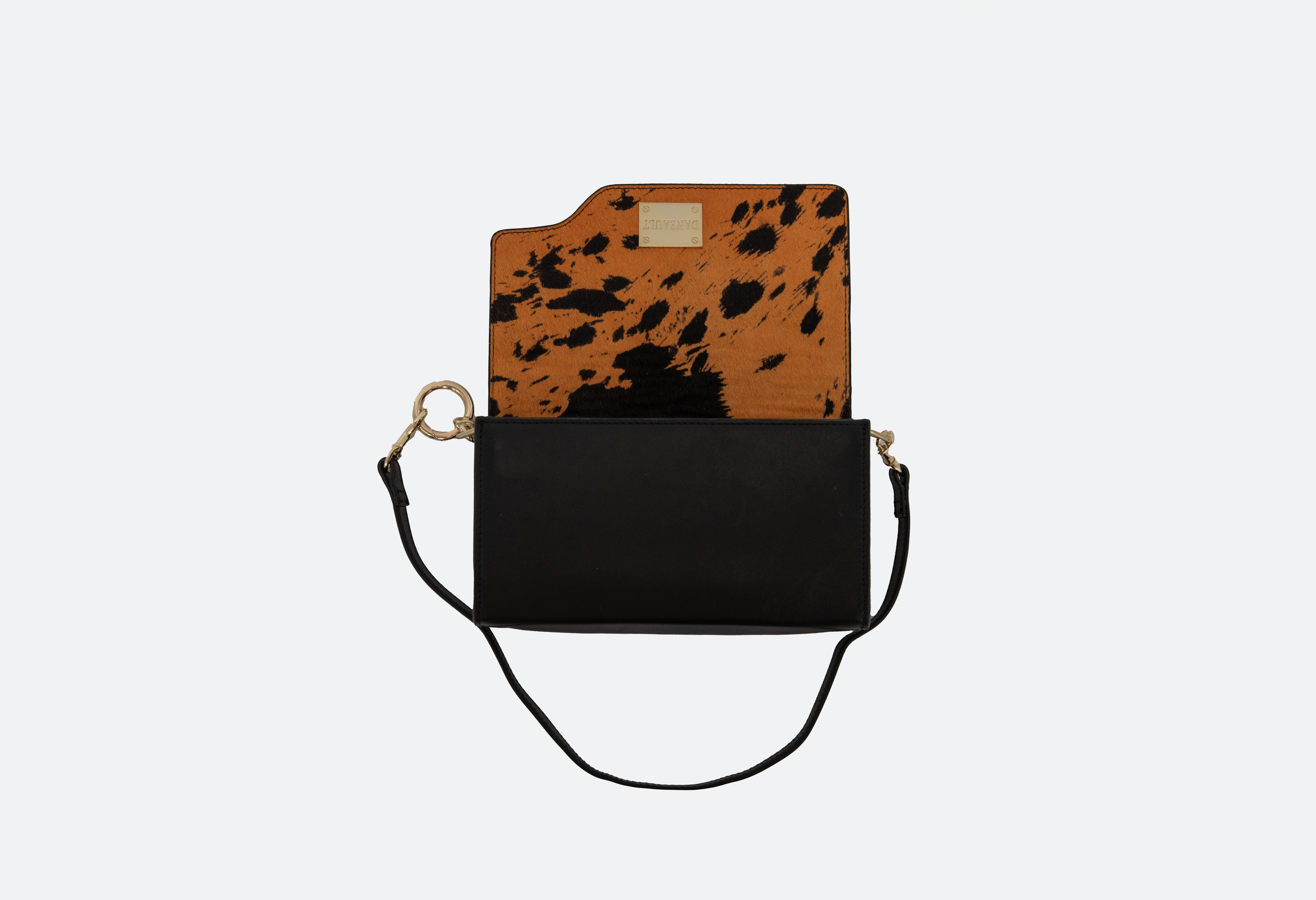 Luxury Leather Patented Reversible Purse- Printed Cow Hair Leather, & Vegetable Tanned Black Leather on Orange &  Black Colorway
