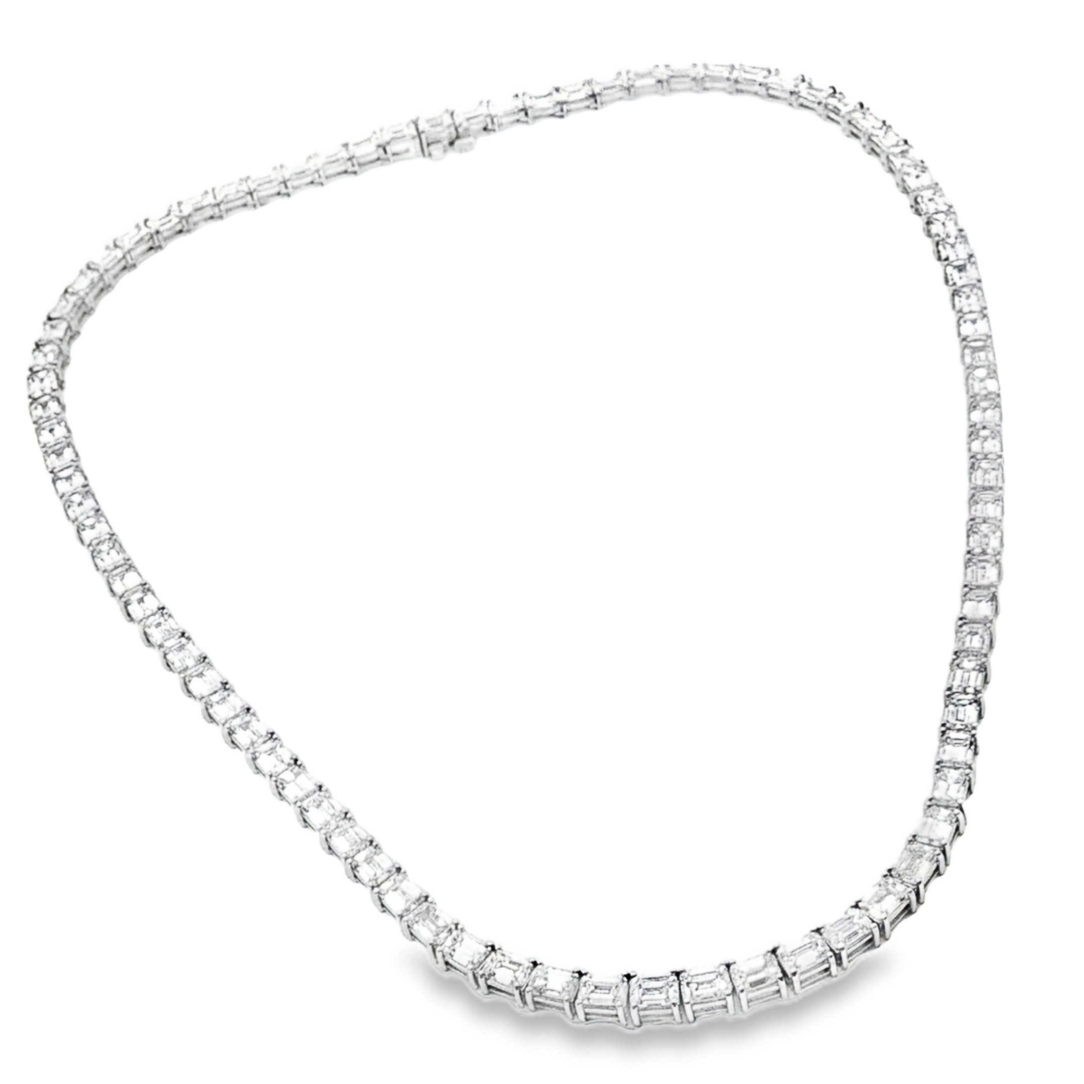An exquisite diamond necklace set in lustrous white gold. This piece features meticulously step-cut, emerald-shaped diamonds, each carefully chosen for their exceptional brilliance and clarity.