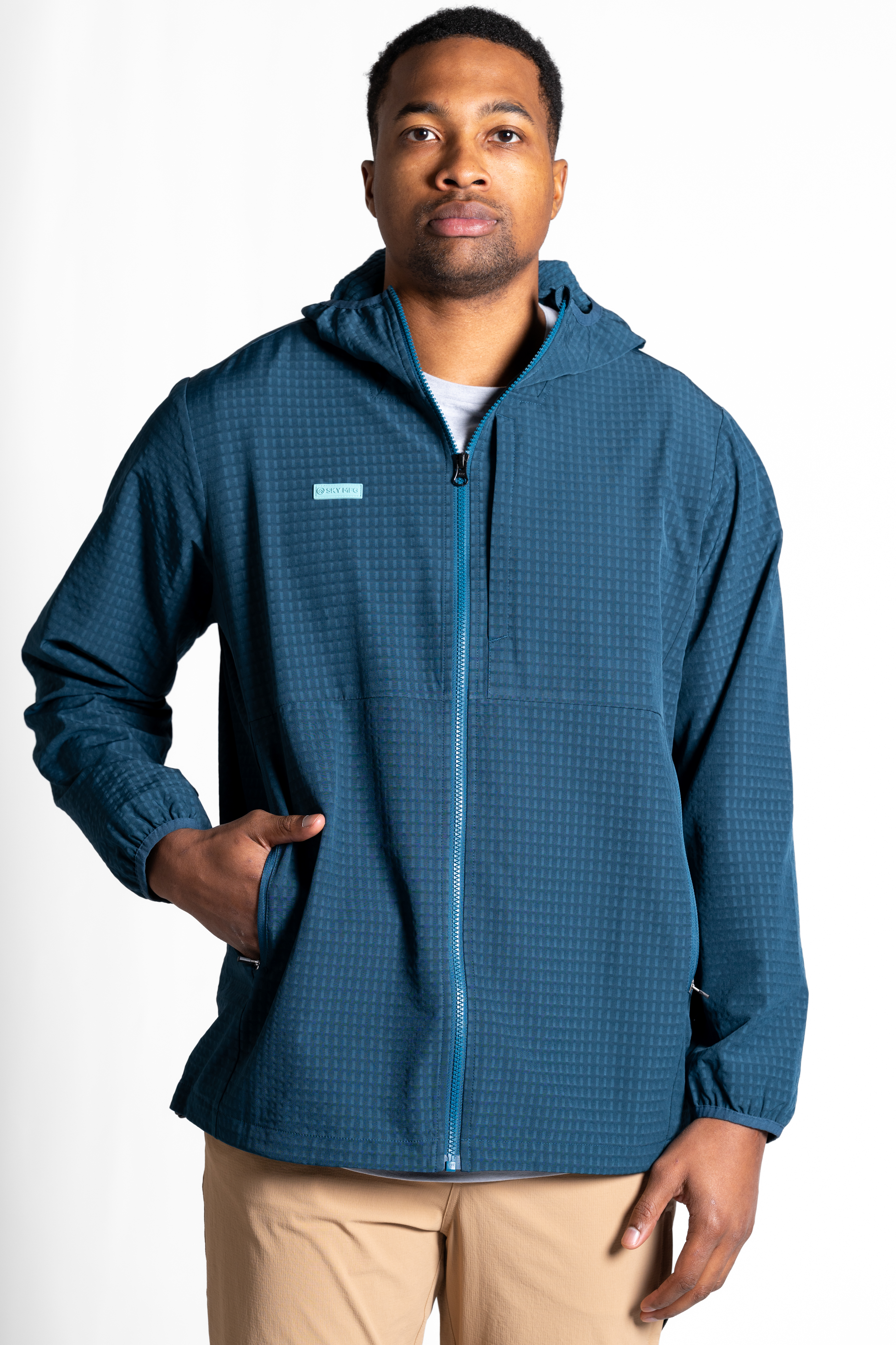 Lightweight with a brushed interior to trap heat, CoreGrid is the perfect shell for shoulder season activites.