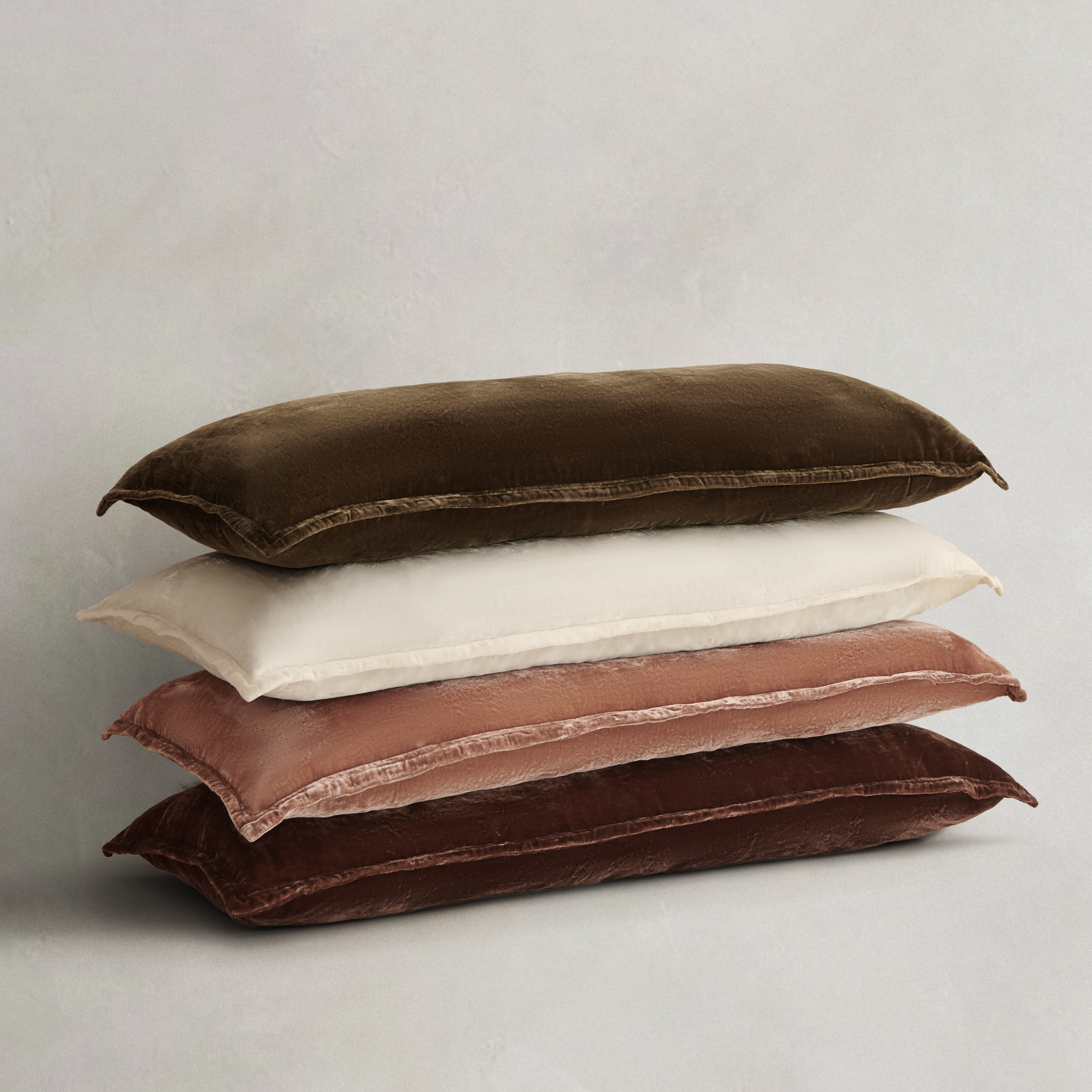 Silky faux silk velvet in rich tones adds plush, oversized comfort and refined style to your bed or sofa, making a bold yet elegant accent that layers beautifully with other pillows.