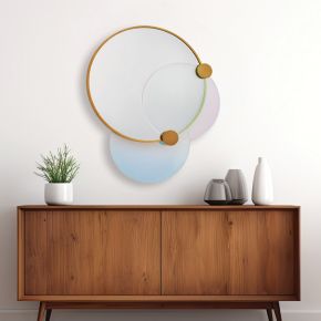 The Colorways mirror, designed by Grace Denniston, is adorned in two dazzling dichroic glass rounds and finished in True Brass.