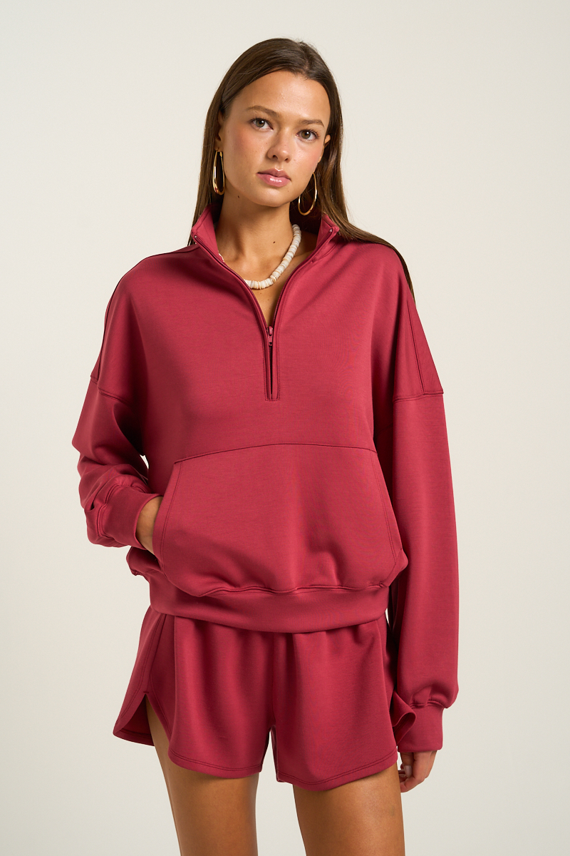 This cute sweatshirt can be worn over a cami for layering or with jeans for those quick, out the door days. The half zip allows for breathability while the pockets allow for high functionality.  M2194