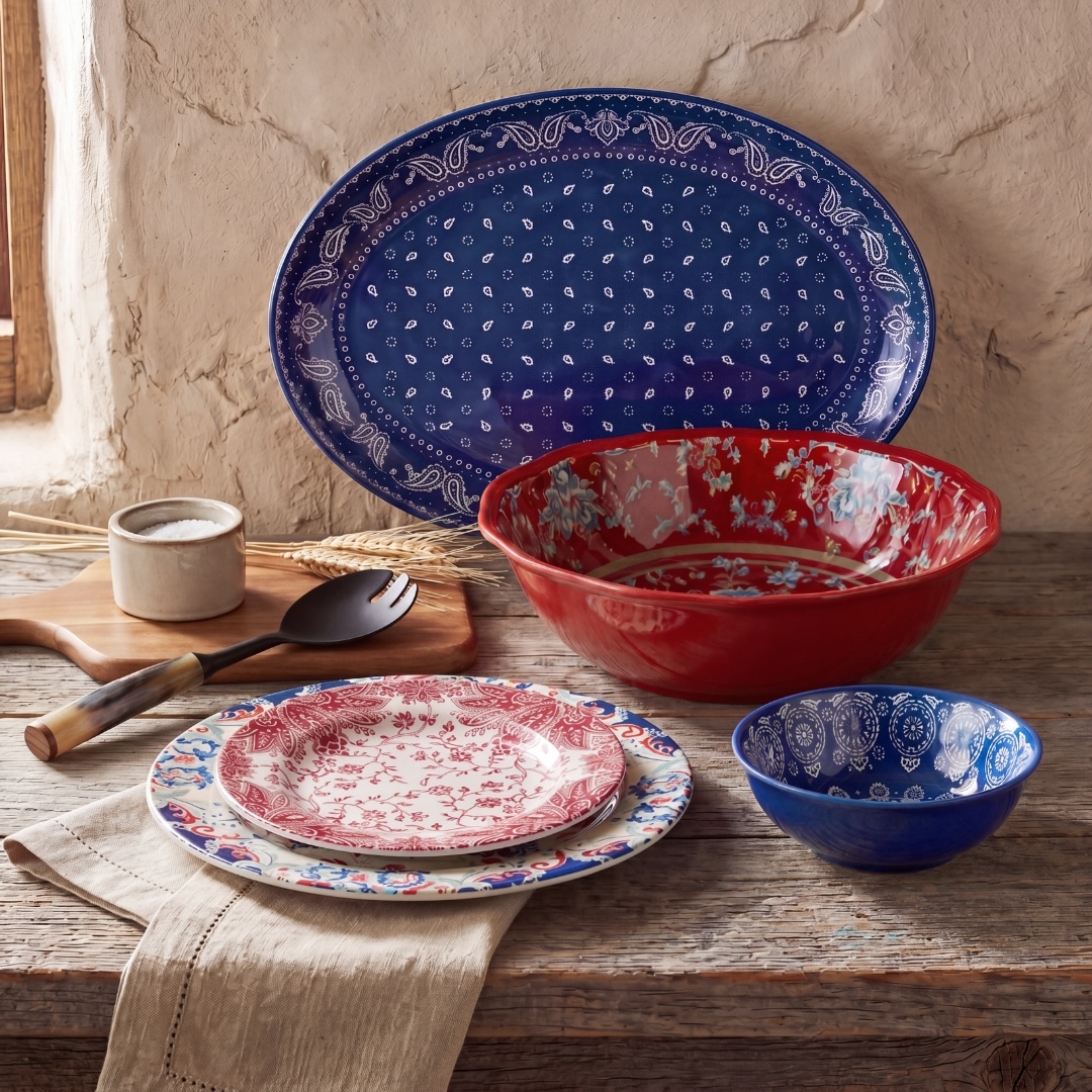 Two designs, same easy hosting. Paisley Bandana layers florals and paisley like a well-loved quilt; Western Americana centers three horses and a roping cowboy. Fourteen pieces set a full table.