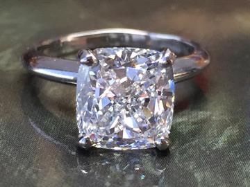 Cushion cut diamond engagement ring
