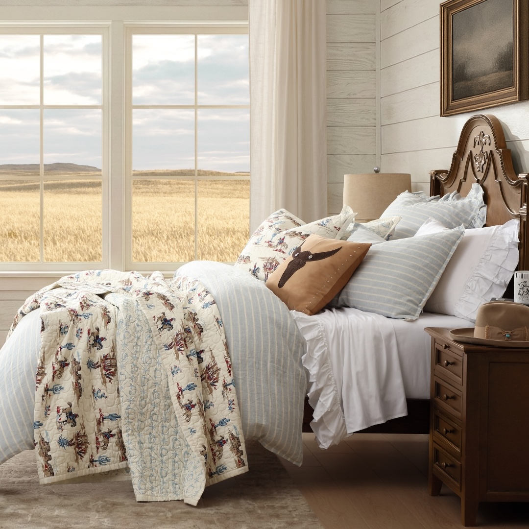 Cowboys, mesas, and desert flora in vintage tones reverse to an iconic Stetson hat print. Tightly woven cotton twill face, quilted for softness and breathable comfort.