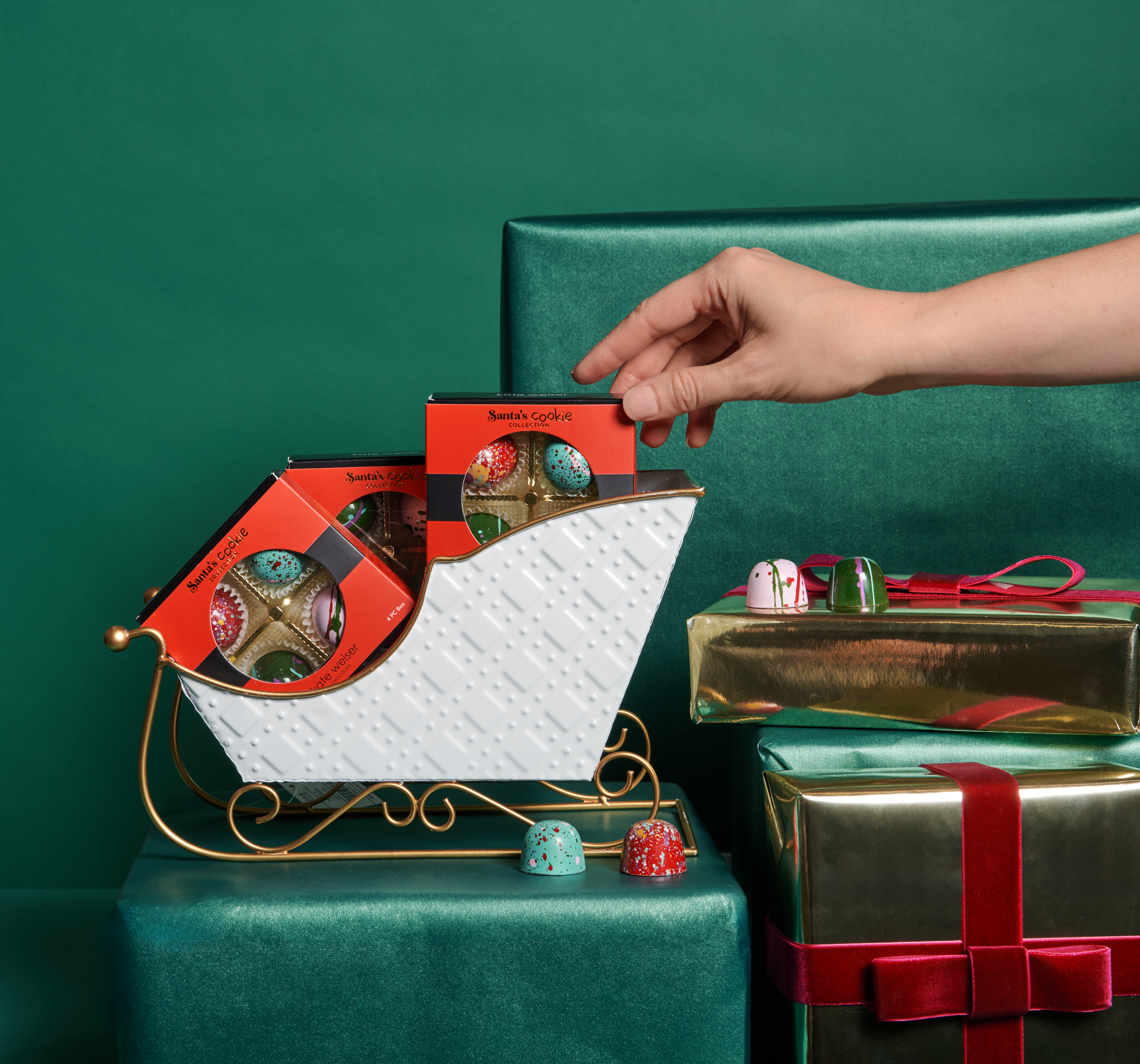 This festive assortment includes one of each holiday cookie-inspired bonbon: Cookie Butter Crunch, Snickerdoodle, Gingerbread, and Peanut Butter.