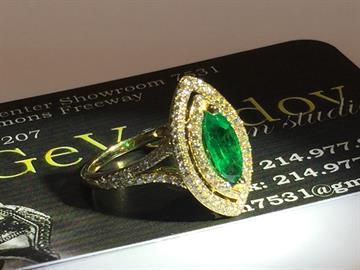 Natural emerald and diamond ring