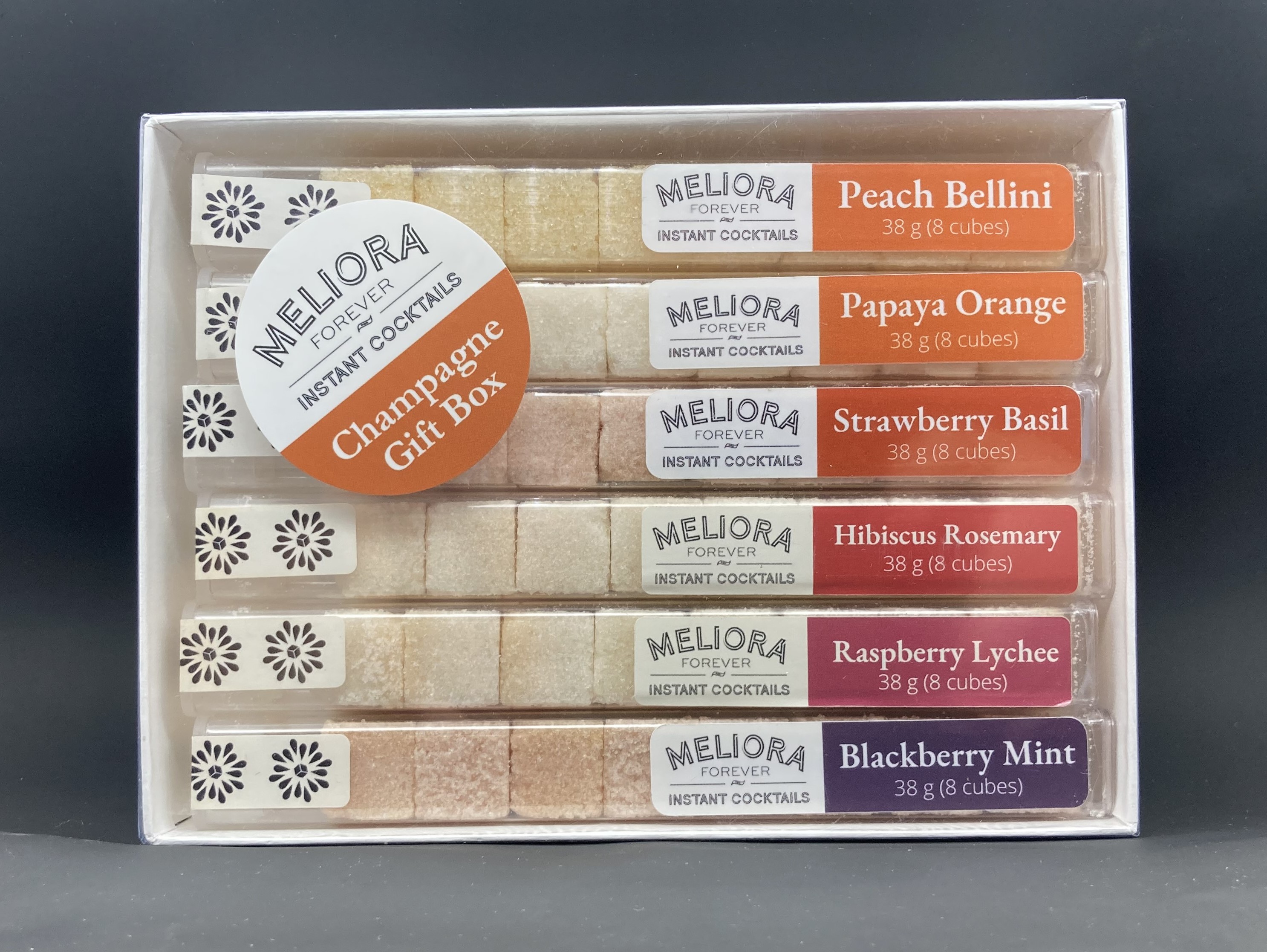 Includes shrink wrapped box containing all 6 Champagne Cocktail Flavors