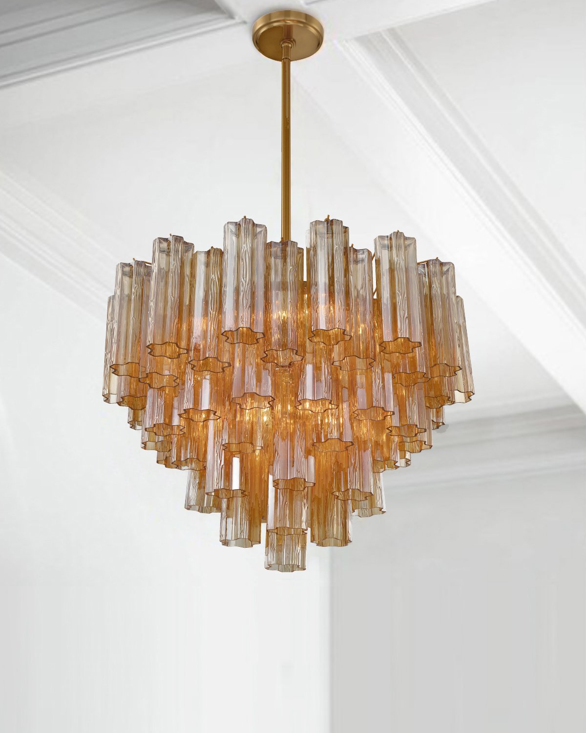 The captivating Addis fixture is a modern-day interpretation of the iconic mid-century Tronchi chandelier. Featured in a Polished Chrome or Aged Brass metal frame that exudes sophistication and style.