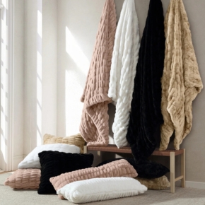 Experience timeless elegance with our Ruched Rabbit throw.