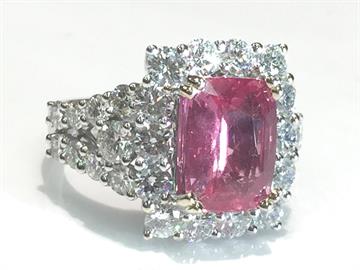 Pink sapphire and diamond ring