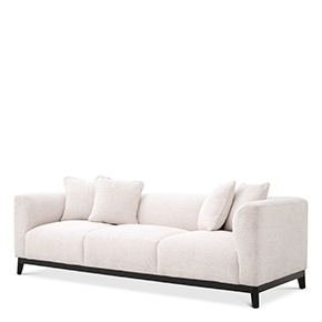 Featuring a striking tuxedo silhouette with a mid-high back and track arms, this armchair is enveloped in a Lyssa off-white upholstery and mounted on a sleek black finish frame.
