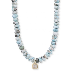 Designed to make a statement, the Arden Necklace pairs natural blue stone beads with a luminous faceted emerald-cut pendant for a look that feels both elevated and effortless.