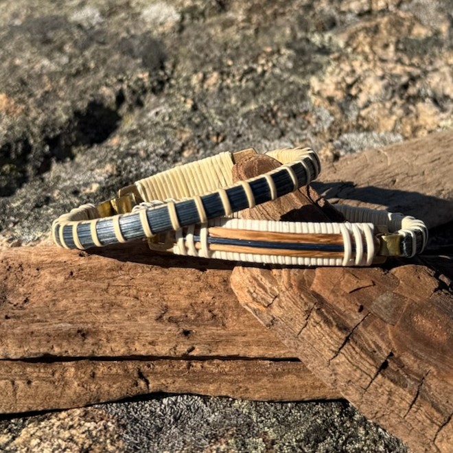 A coastal take on Americana, this 1/4-inch wide clasp bracelet is hand-woven with upcycled white oak and hand-dyed navy cane. Small and Large sizes fit most wrists.