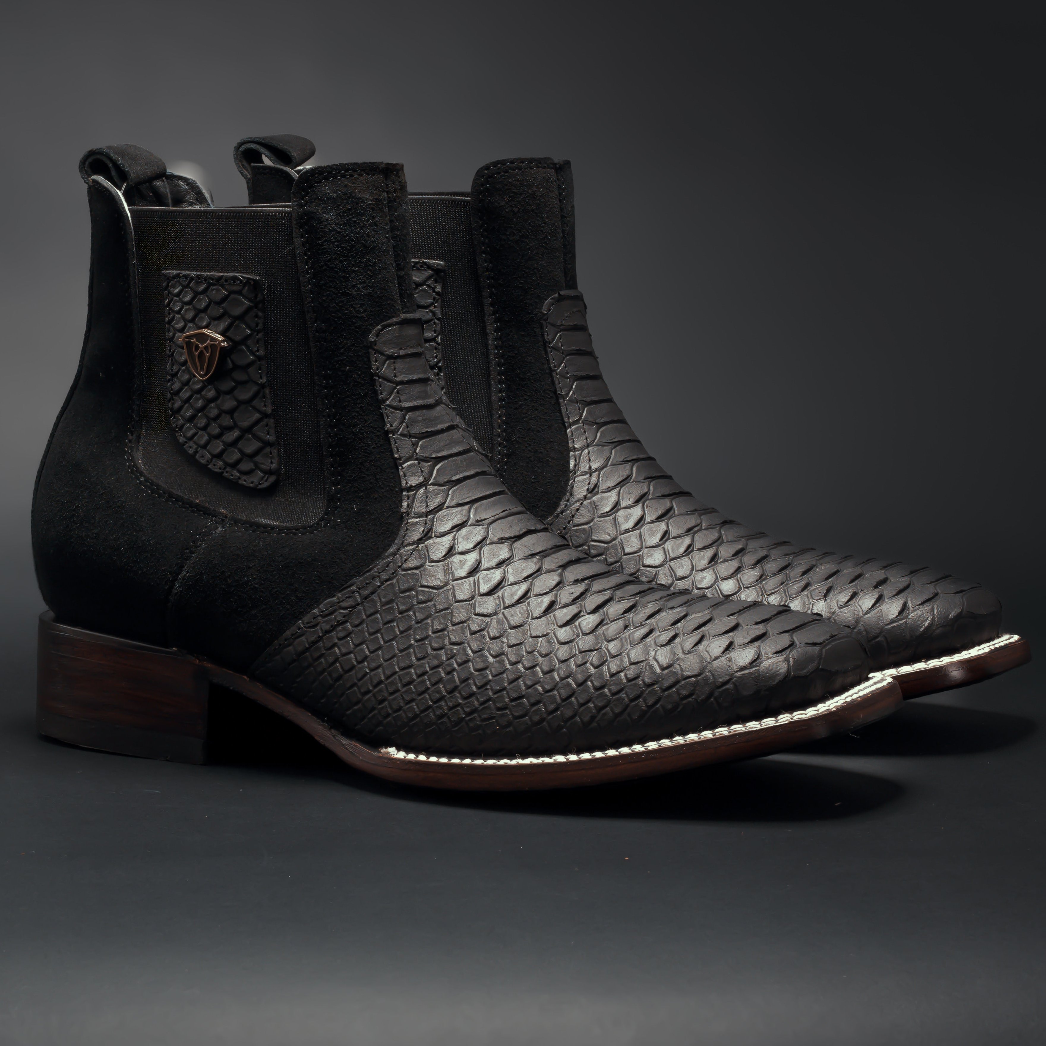 Python Tribute Design: Hand-sliced leather with an airbrushed finish that captures the elegance and boldness of real python.