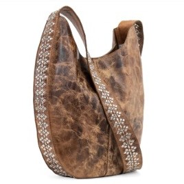 One of Calleen's most iconic designs, the Evoke messenger bag features solid brass or nickel studded artwork on full grain, high quality leather.