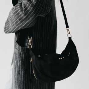 Elevate your ensemble with the Netty Nubuck Crossbody, crafted from soft vegan nubuck leather with a sleek silhouette, refined details, and seamless comfort.