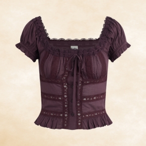 A romantic blouse designed with delicate lace insets and soft pleating throughout.