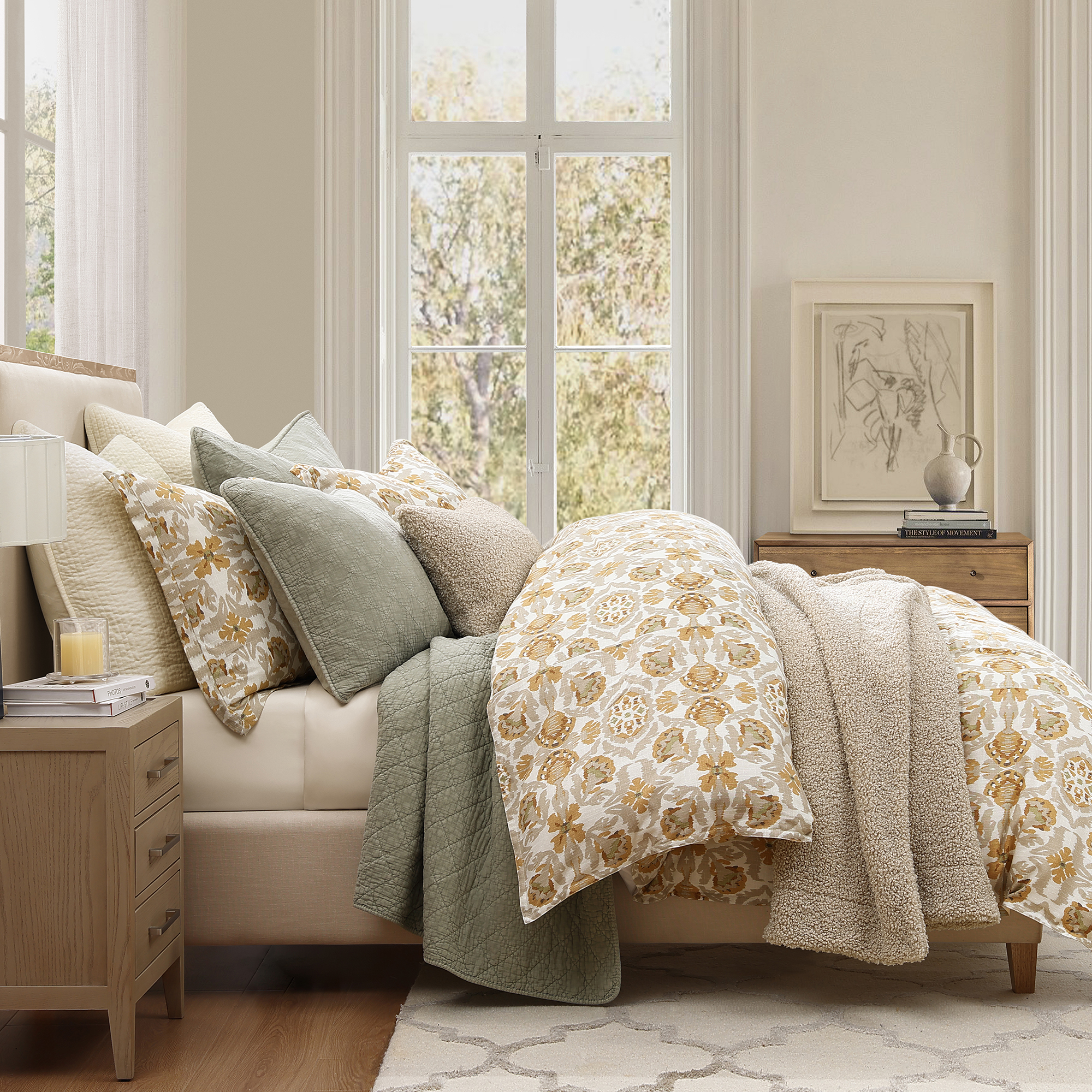 Vintage-inspired marigolds form medallion patterns in sage and cream tones. Our easy-care linen blend offers relaxed sophistication without the fuss, perfect for everyday luxury.