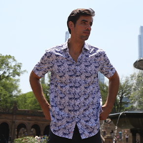 Chill in comfort with our printed short sleeve button down. Fun and classic palms will be the talk of the party.