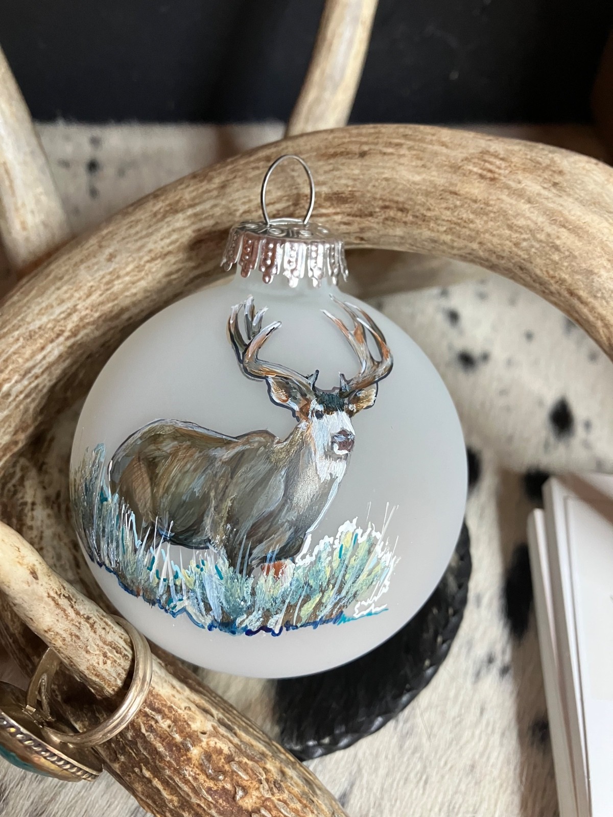 Acrylic painting of the majestic Ghost of the Rockies - a Mule Deer Buck in the snowy sage.. AMERICAN WEST WILDLIFE Series features a wide spectrum of wildlife favorites