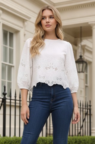 Embroidered eyelet detailing top
