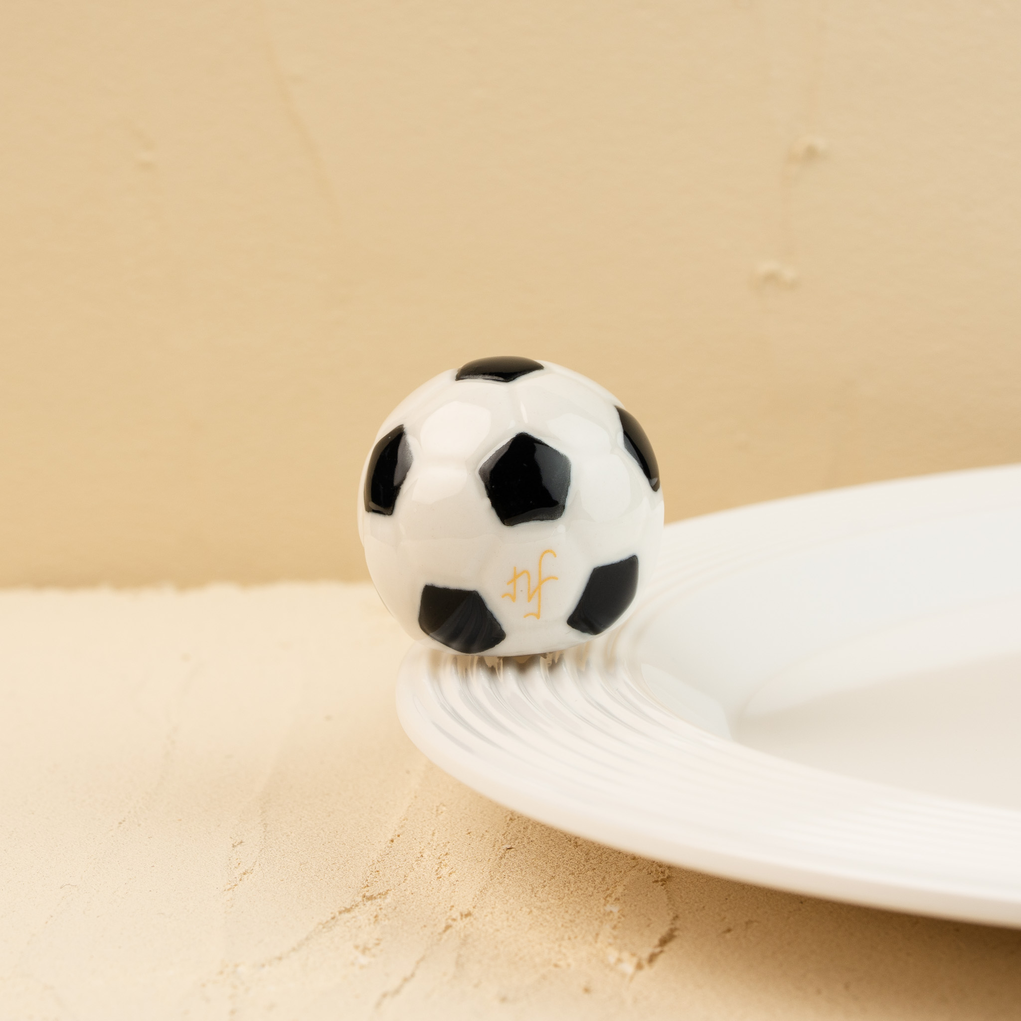 kickin’ it celebrates teamwork, victories, and the joy of the game. inspired by backyard matches and championship moments, this soccer mini is ready to celebrate every goal.