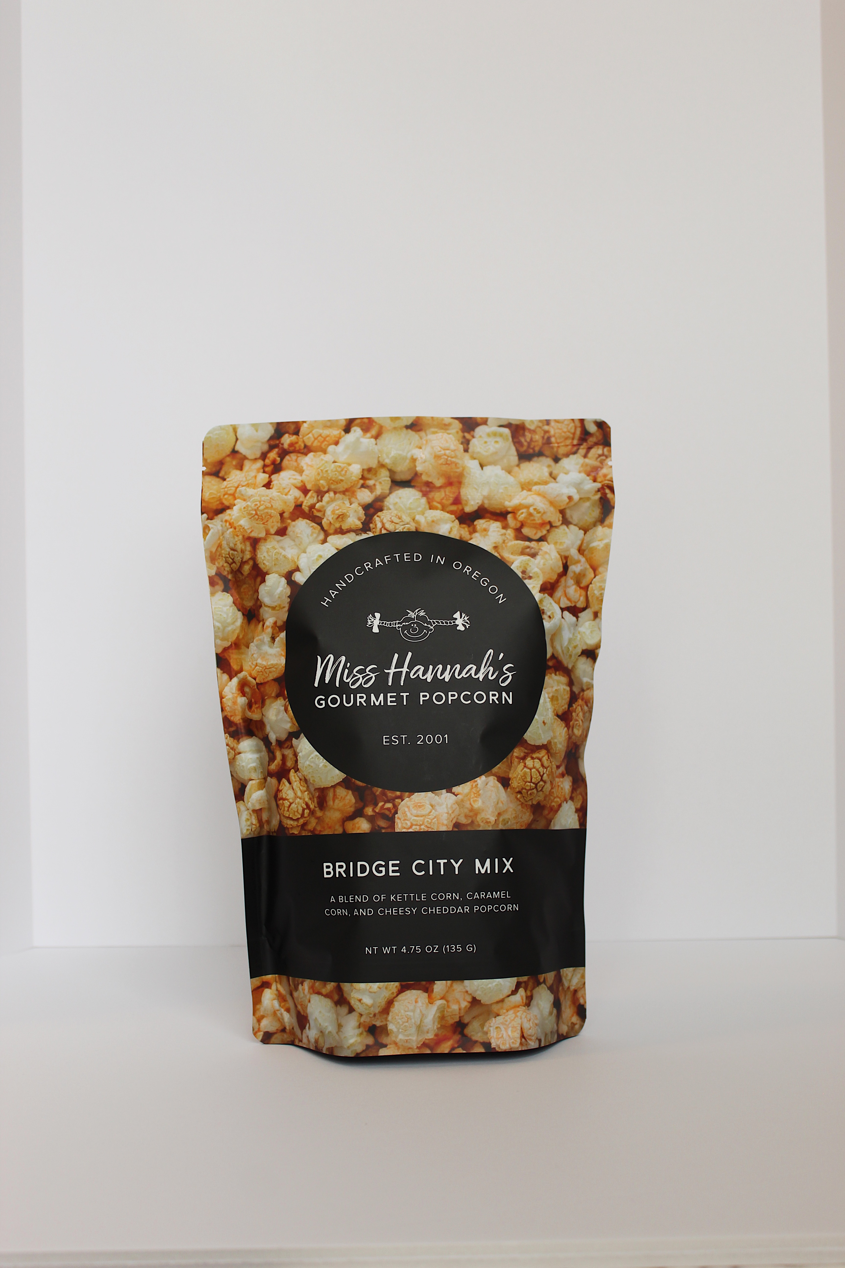 Front profile of Bridge City Mix Popcorn packaging