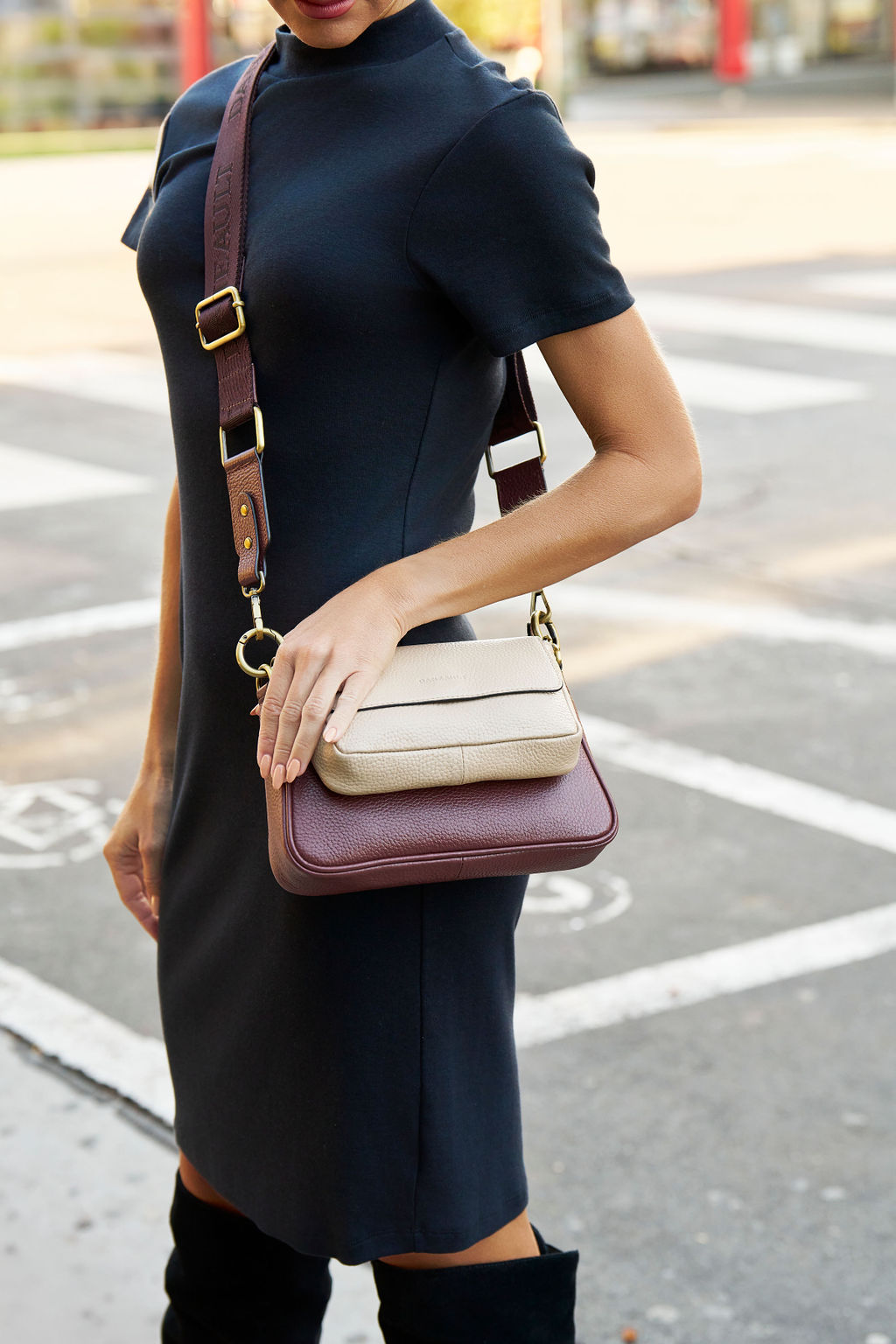 A versatile leather duo designed for modern travelers. It features a compact crossbody for essentials and a spacious carry-all for travel needs, offering flexibility to mix and match.  