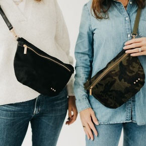 Brings playful texture and hands-free versatility with its unique hair-on-hide design, adjustable strap, and four eye-catching prints to match every mood.